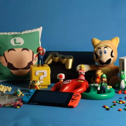 A Nintendo Switch and a Bunch of Super Mario Game Items